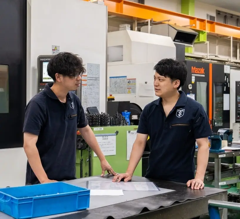 A meeting at the factory